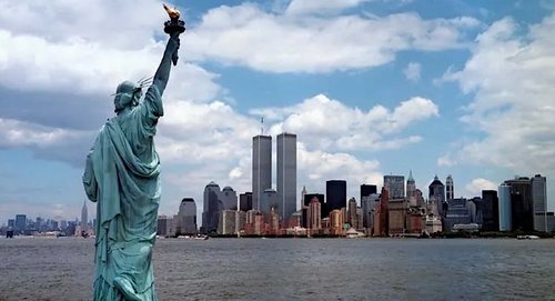 The Statue of Liberty (foreground) and the Manhattan skyline as it appeared before the September 11, 2001, attacks